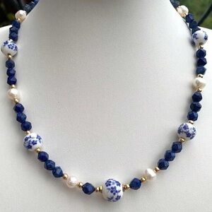 Black Beaded Necklace with Jesus Pendant